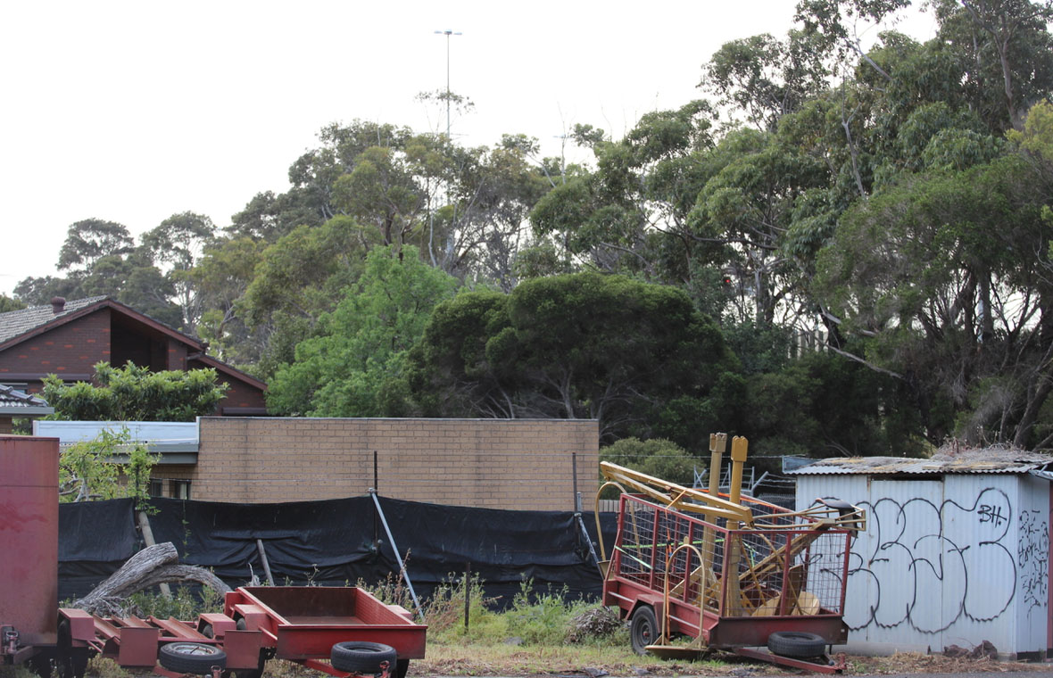2015 photo of trailers stored on DoT land next to 7 Cullen Court